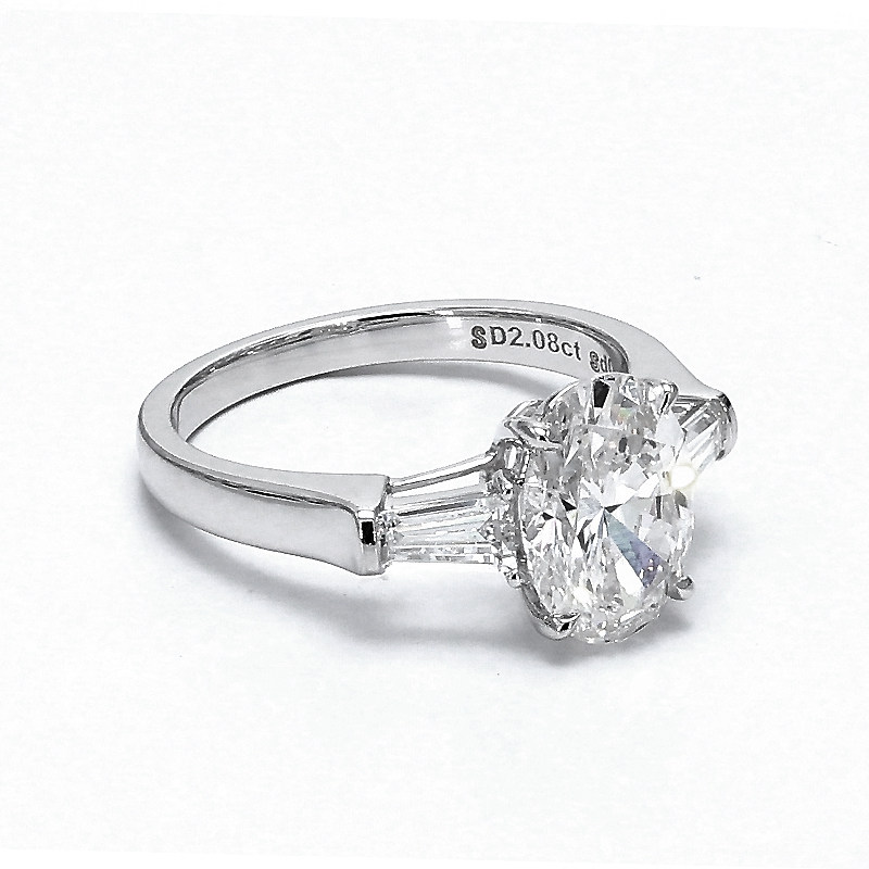 2.575 ct. tw. Oval Cut Center Stone & 2 Emerald Side Stones Engagement Ring details
