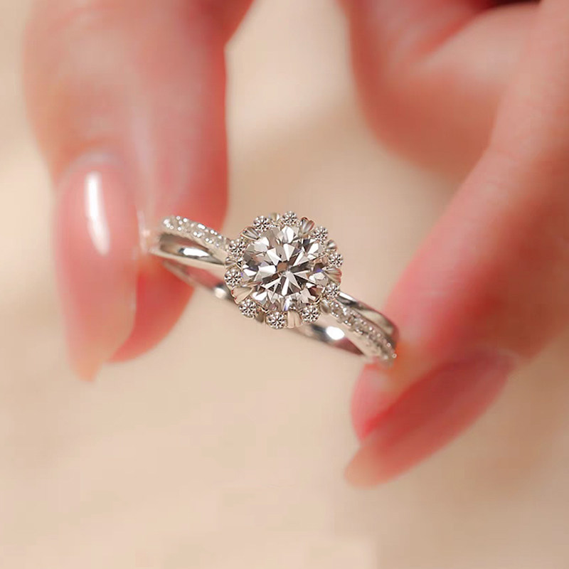 Floral Shaped Round Main Stone Staggered Halo Ring With Intertwined Half Pave Band