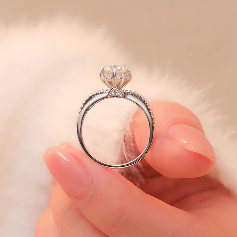 Floral Shaped Round Main Stone Staggered Halo Ring With Intertwined Half Pave Band in white gold