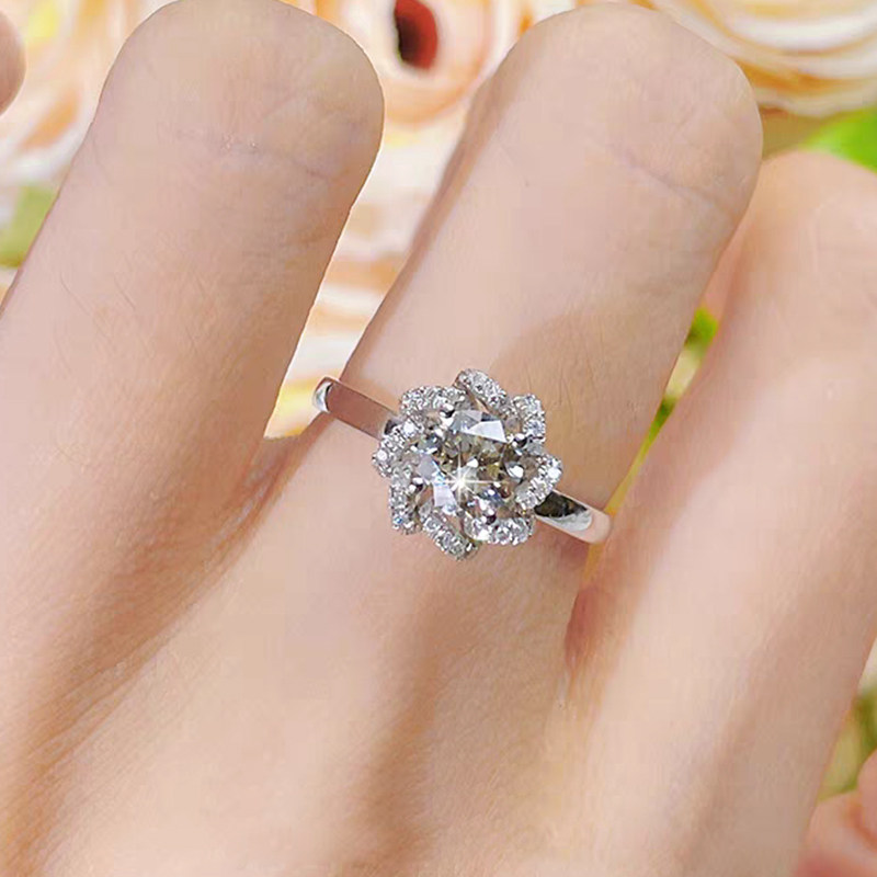 Hollow Floral Shaped 4 Prong Roung Cut Engagement Ring With Plain Polished Band wear effect