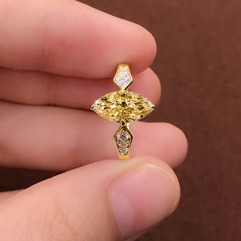Luminous Solitaire Marquise Cut Yellow Synthetic Diamond Ring With Geometric Shoulder