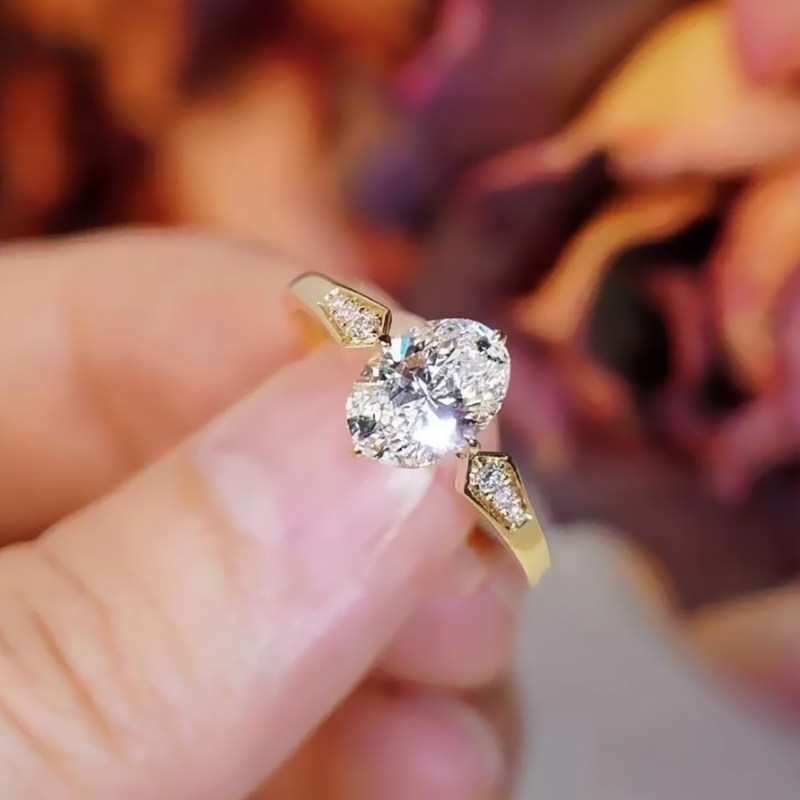 Solitaire Oval Cut Float Setting Diamond Engagement Ring With Geometric Shoulder wear view