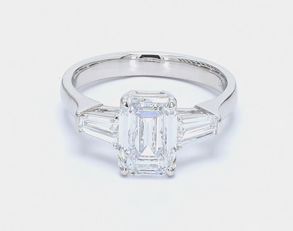 2.21 ct. Eternity Center Emerald Stone With 2 Trapezoid Side Stone Engagement Ring