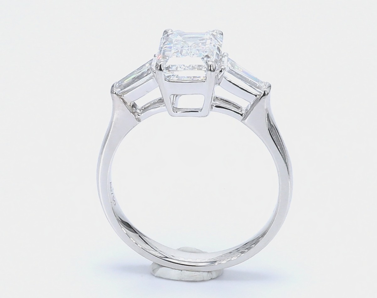 2.21 ct. Eternity Center Emerald Stone With 2 Trapezoid Side Stone Engagement Ring side view
