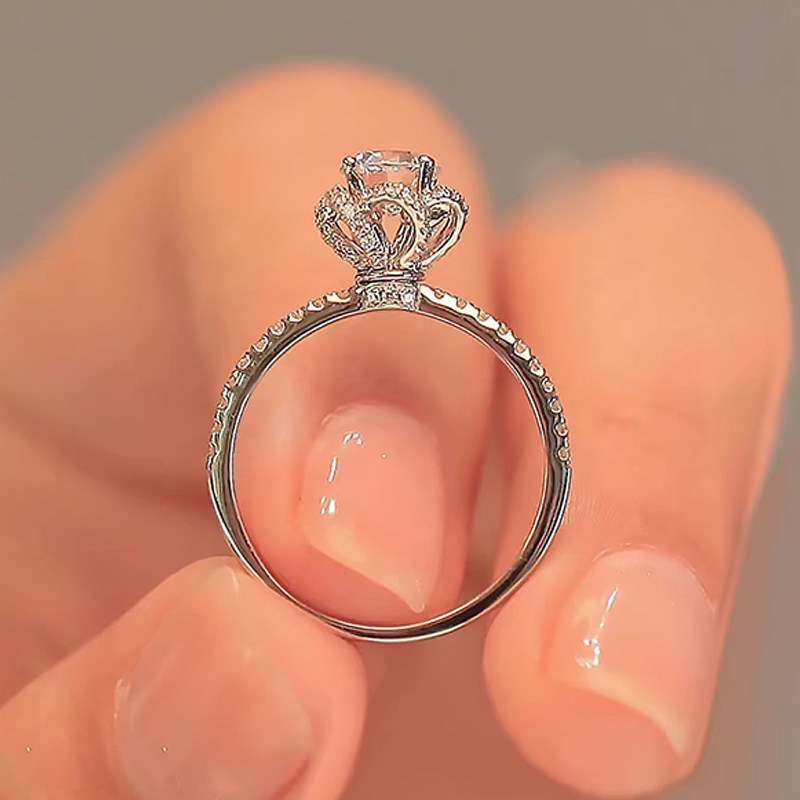 4 Prong Hollow Pave Bouquet Head High Profile Diamond Ring With Half Pave Thin Shank in hand