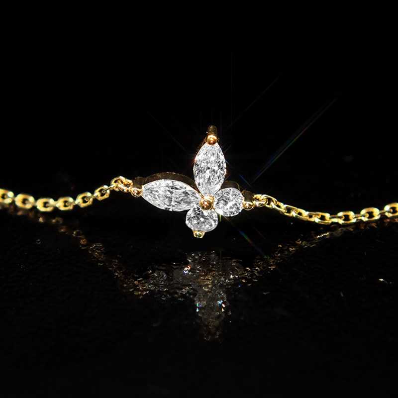 5 Prong Diagonal Butterfly Design Ethical Lab Diamond Yellow Gold Bracelet close view