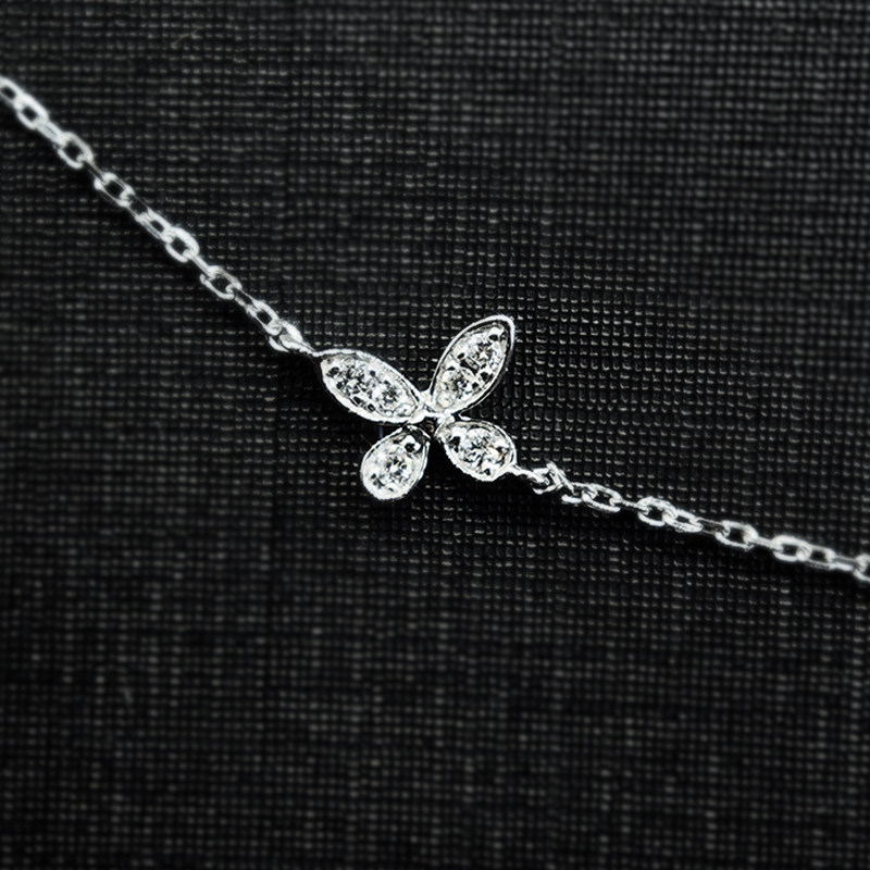Alternating Petite Butterfly Motif Pave Cultivated Diamond Necklace in black background