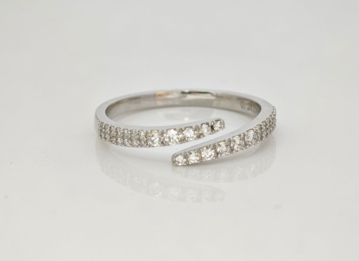 Bypass Split Double Row Pave White Gold Man Made Diamond Adjustable Stackable Wrap Band lay on table