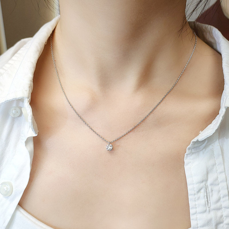 1 Carat Minimalist 4 Prong Round Cut Diamond Necklace in White Gold wear effect