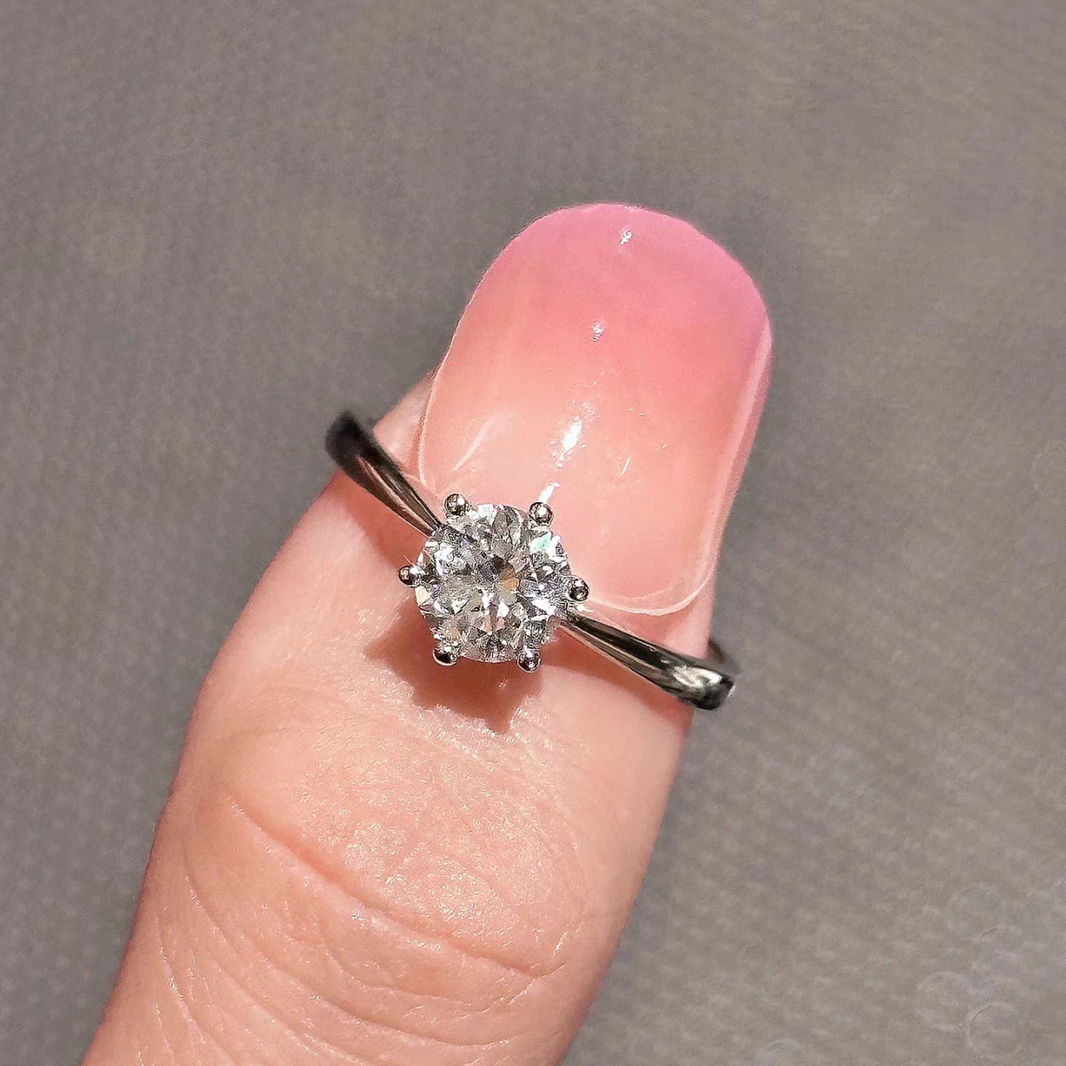 Classic Minimalist Solitaire Round Cut Diamond Ring With Inner double bezel raised edge Shank wear effect