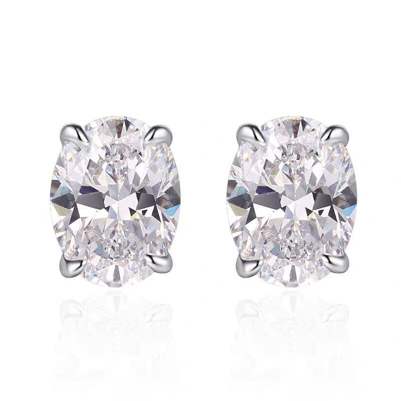 Timeless 4 Prong Oval Cut Solitaire Lab Diamond Stud Earring blank background