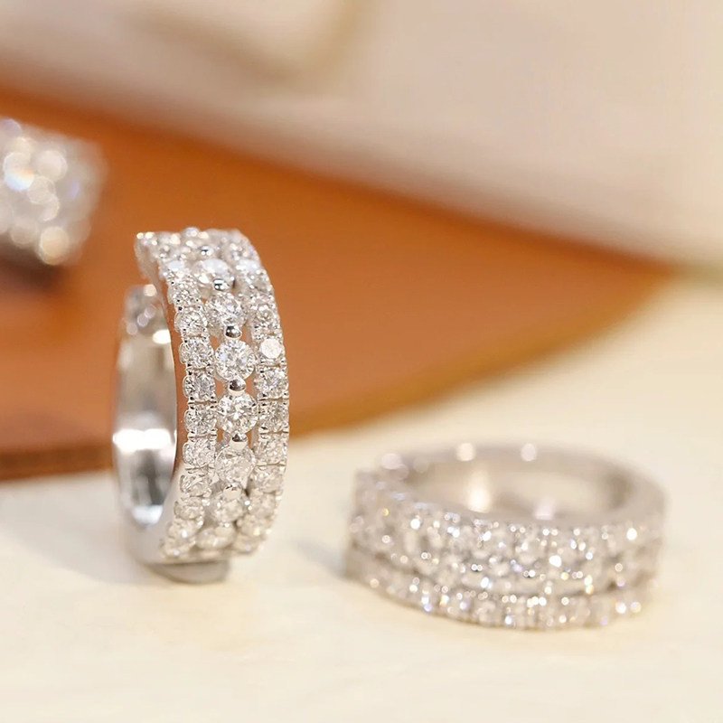 Triple Row Pave Center Hollow Man Made Diamond White Gold Huggie close up
