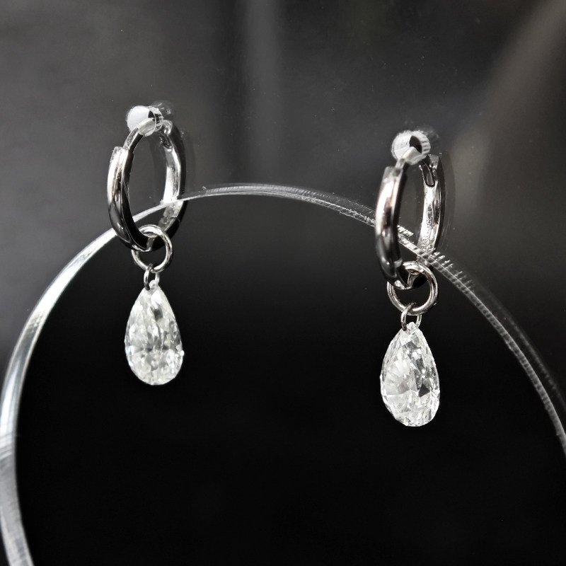 Solitaire Pierced Pear Cut Drop Earring With Plain White Gold Leverback close up