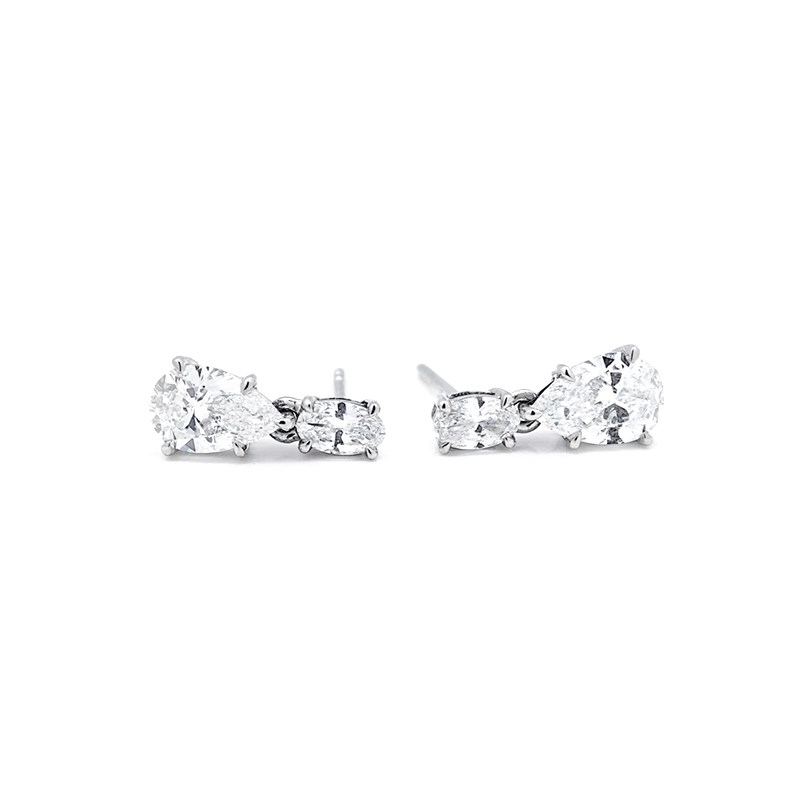 4 Prong Pear Cut Man Made Diamond Drop Earrings With Oval Cut Side Stones front side