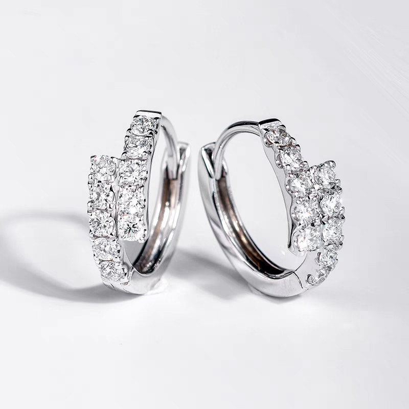 Symmetrical Bypass Overlapping Half Pave Lab Grown Diamond Huggie Earrings in blank background