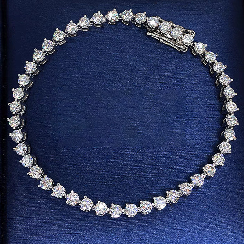 Continuous 3 Prong Round Cut Dual Layer Open Gallery Lab Diamond Tennis Bracelet in blue background