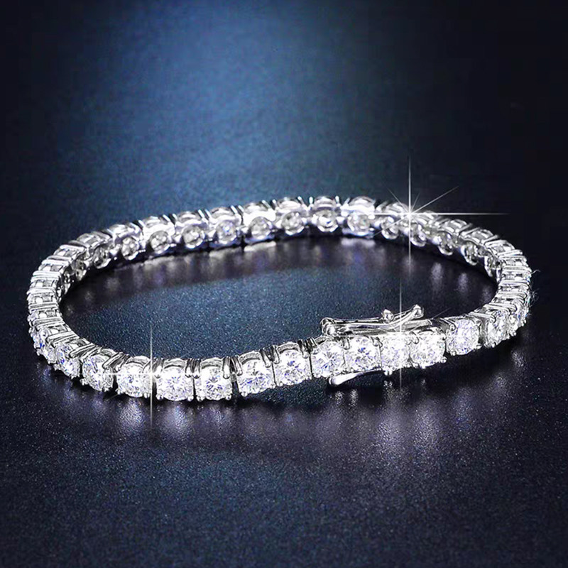 Classic Individual 4 Prong Round Cut Dual Layer Open Gallery Tennis Bracelet in dark blue background