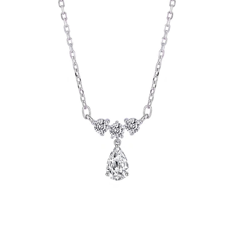 3 Prong Pear Cut Main Stone 3 Round Accents Pendant White Gold Necklace in blank background