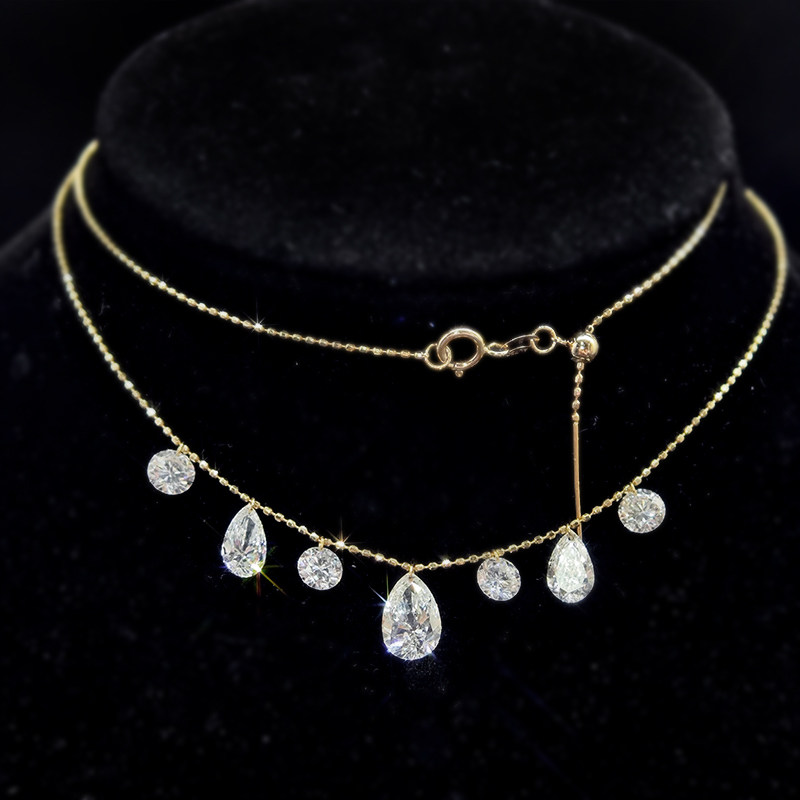 7 Alternating Round & Pear Shaped Pierced Diamond Necklace wearing effect