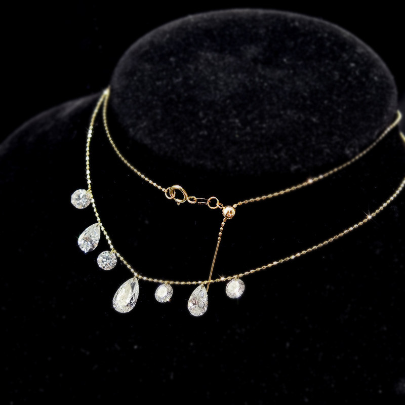 7 Alternating Round & Pear Shaped Pierced Diamond Necklace wearing effect left view