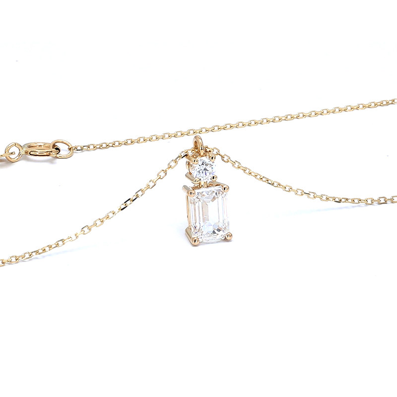 Emerald Cut Main Stone & Round Side Diamond Pendant Necklace in Yellow Gold