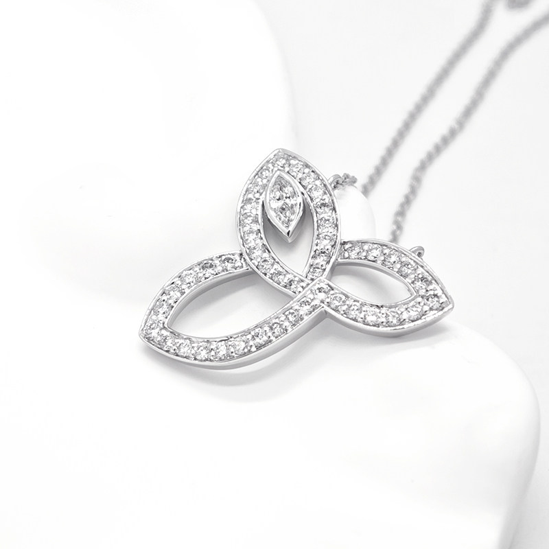 Art Deco Intertwined 3-Leaf Frame Pave Lab Cultured Diamond Pendant Necklace on table