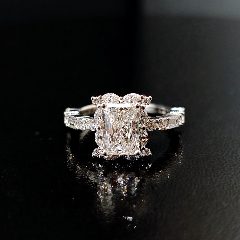 Sparkling Radiant Cut Marquise Side Accents Diamond Ring With Round & Emerald Accents On Shoulder front view