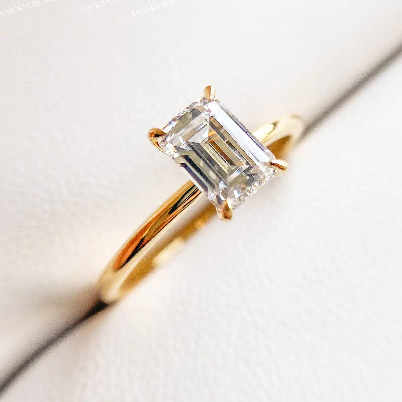 Classic 4 Prong Elerald Cut Man Made Diamond Ring With Plain Round Band in box
