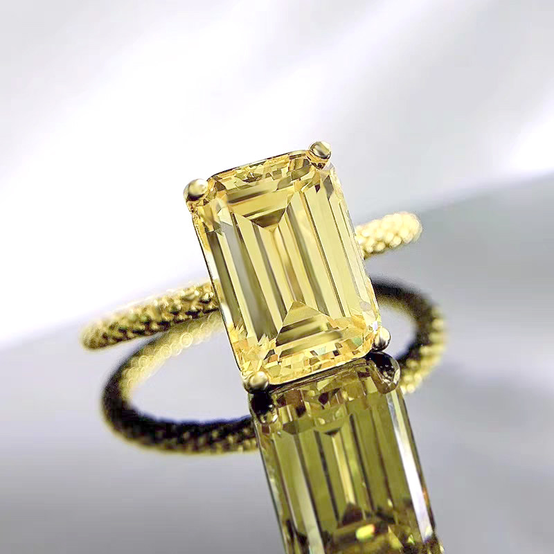 Four Prong Emerald Cut Solitaire Yellow Lab Diamond Ring With Rope Texture Band in yellow gold