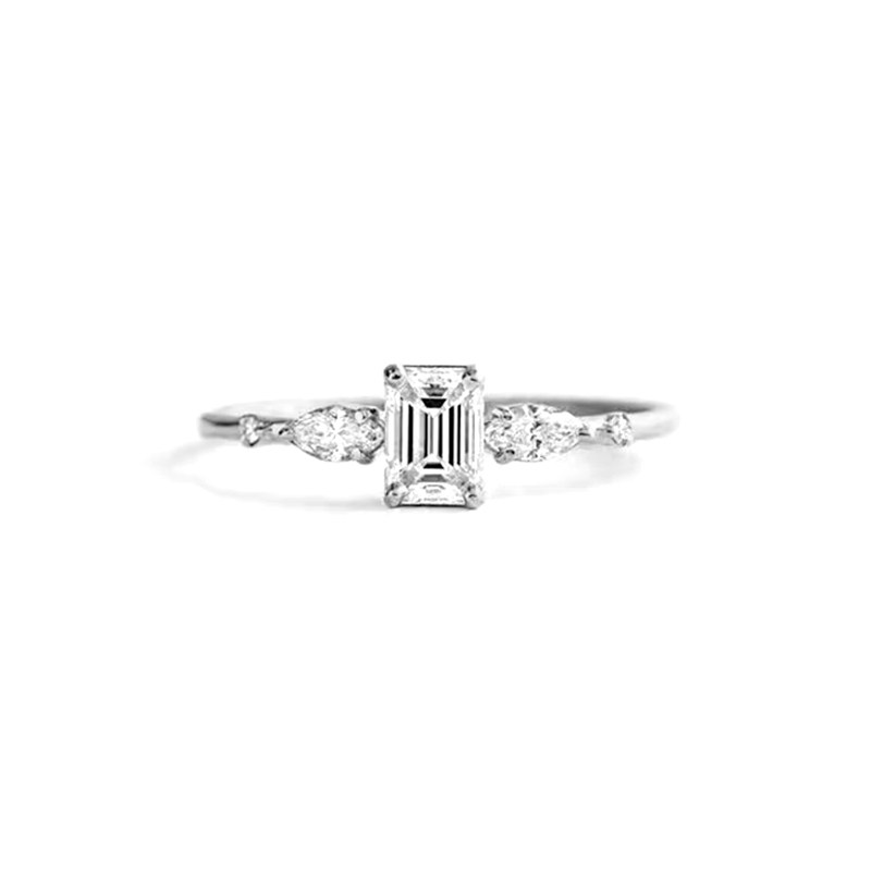 Solitaire Emerald Cut Main Stone 2 Oval Side Accents Diamond Ring With Thin Round Band