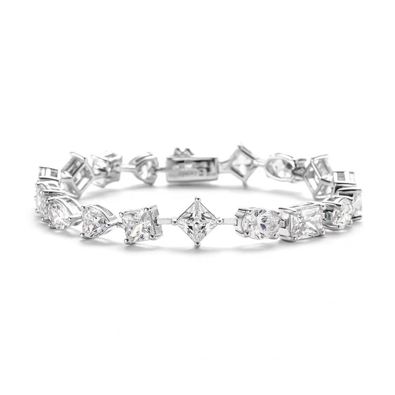 Fancy Shape Dual Layer Open Gallery Alternating Lab Diamond Tennis Bracelet lay on table