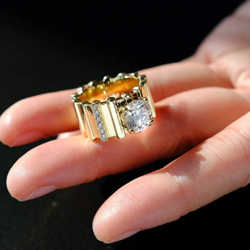 Round Cut Solitaire Diamond Ring With Single Vertical Channel Pave Shoulder Band effect