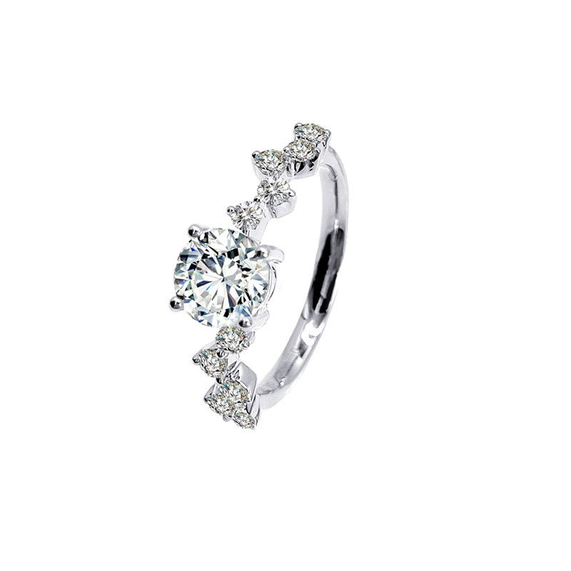 Classic 4 Prong Round Cut Diamond Ring With Staggered Accent on Both Shoulders