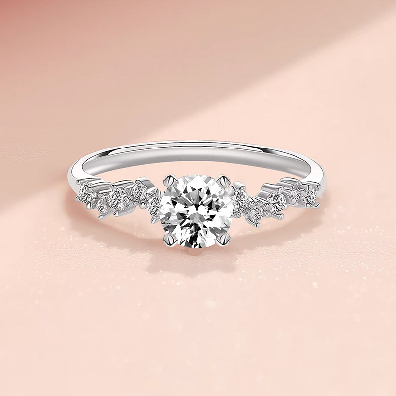 Four Prong Solitaire Round Cut Diamond Ring With Staggered Linked Small Stone Shoulder details