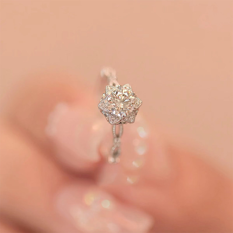 6 Prong Round Cut & Pave Petal Head Diamond Ring With Split Crisscross Half Pave Shank in hand