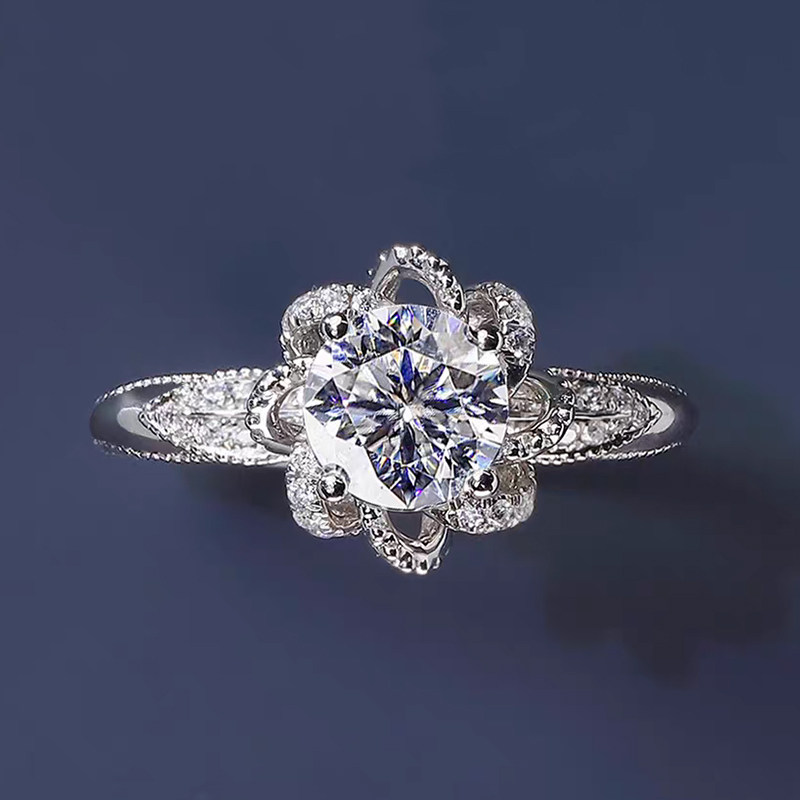Hollow Floral Motif Head 4 Prong Solitaire Lab Diamond Ring With Leaf Shape Pave Shoulder top view
