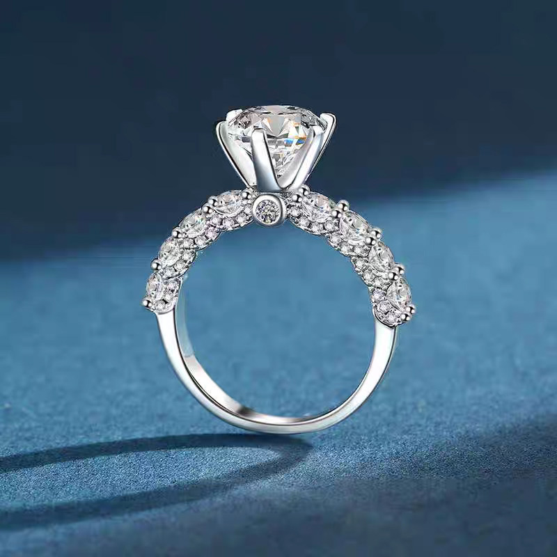 6 Prong Solitaire Round Cut Diamond Ring With 3 Sides Pave Shoulder Band side view