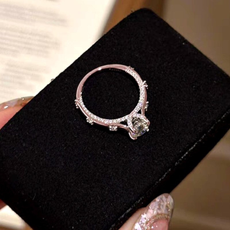 Sparkling 4 Prong Round Solitaire Diamond Ring With Accents and Double Side Halo Shoulder