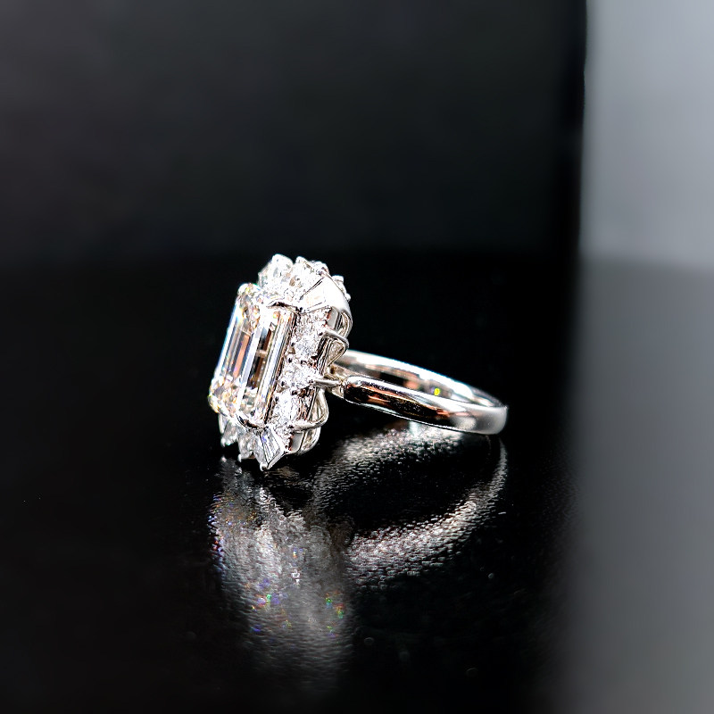 Art Deco Luminous Emerald Cut Halo Diamond Ring With Plain Band side view