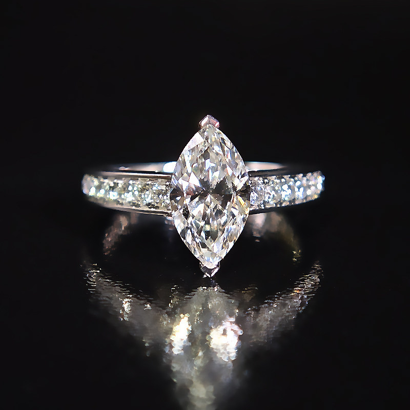 Marquise Cut Solitaire 2 Prong Vertical Setting Diamond Ring With Half Channel Pave Shank front view
