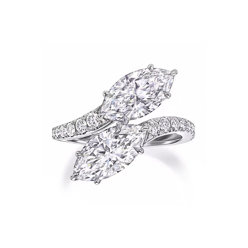 Two Brilliant Marquise Cut Diamond Ring With Half Pave Bypass Shoulder Shank blank background img