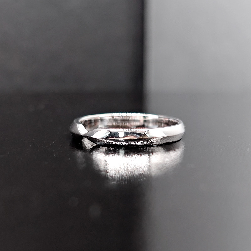 Minimalist Men's Wedding Ring With Raised Ridge Band Without Diamonds on desk
