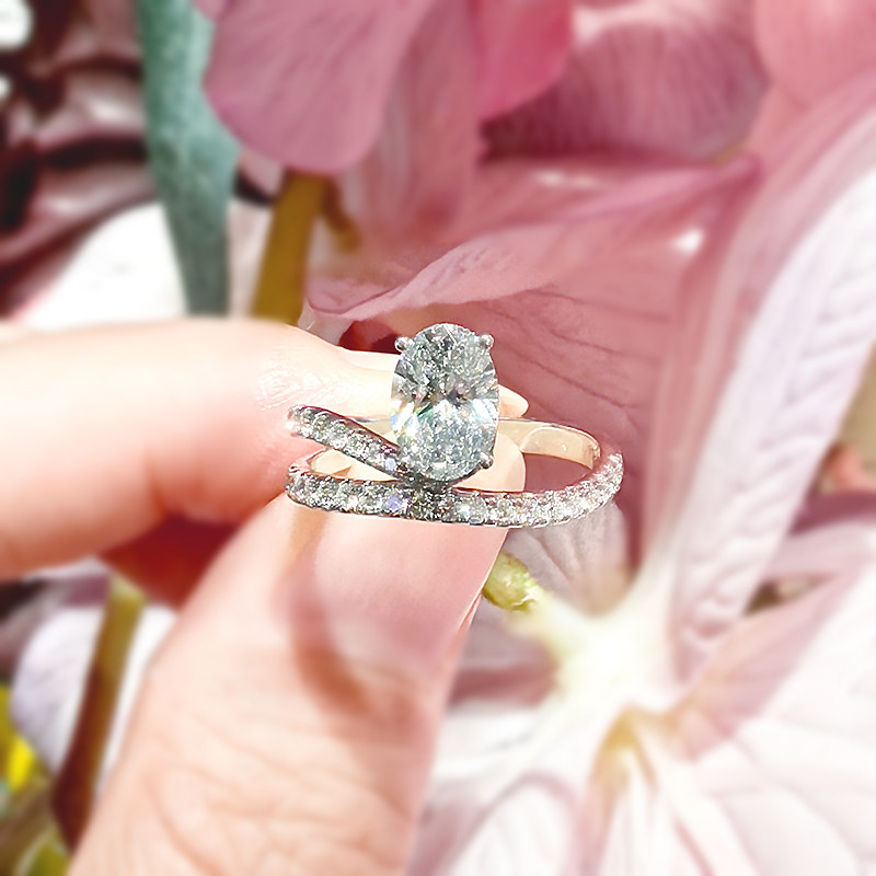 Brilliant 4 Prong Oval Cut Man Made Diamond Ring With Split Half Pave Winding Shank