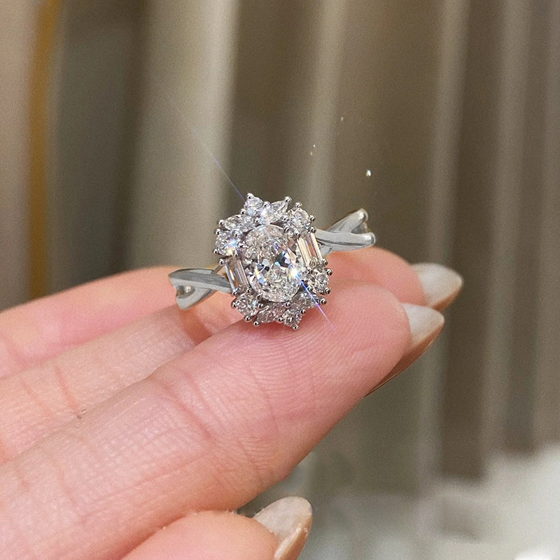 Oval Cut Main Stone Cluster Accents Diamond Ring With Crisscross Shoulder Plain Band
