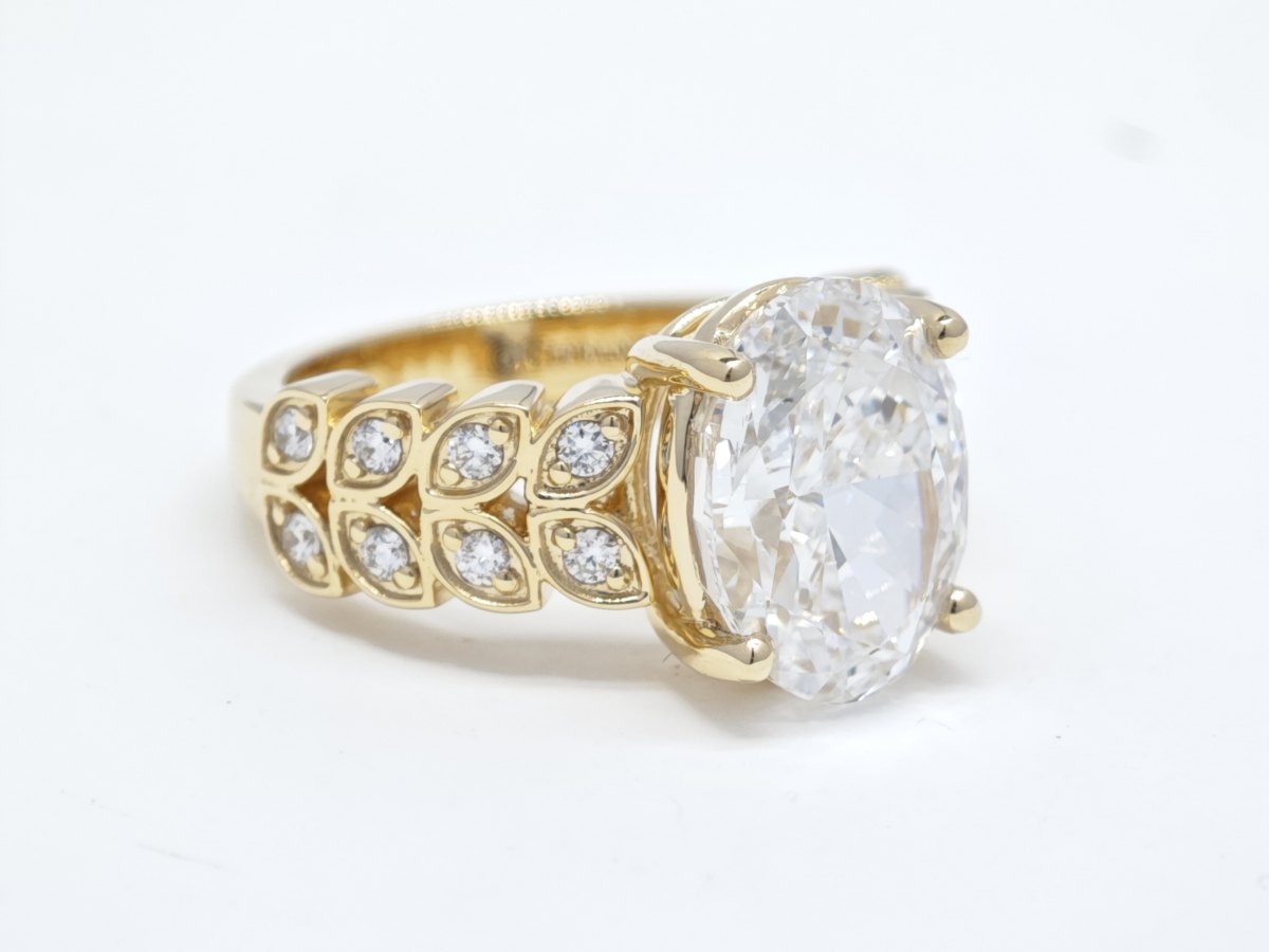 Oval Prong Bezel Leaf Motif Shank Manufactured Diamond Vintage Stackable Ring side view