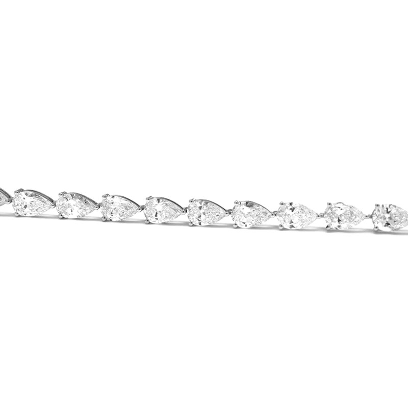 Continuous 3 Prong Pear Cut Diamond Open Gallery & Open Bottom Set Tennis Bracelet chain details