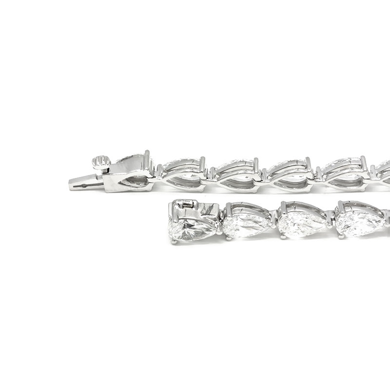 Continuous 3 Prong Pear Cut Diamond Open Gallery & Open Bottom Set Tennis Bracelet details
