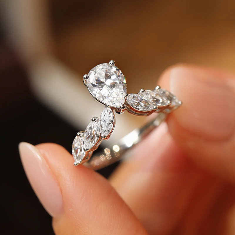 Crown Inspired Pear Cut Main Stone & 6 Marquise Cut Side Stone Lab Diamond Ring