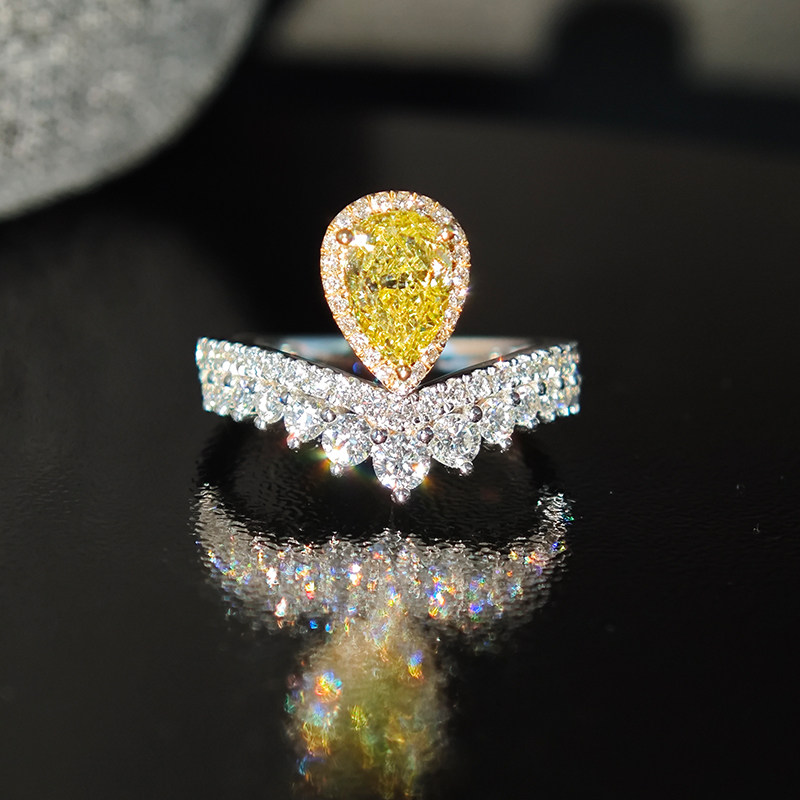 Crown Motif Yellow Pear Cut Halo Diamond Ring With Curved Half Pave Band