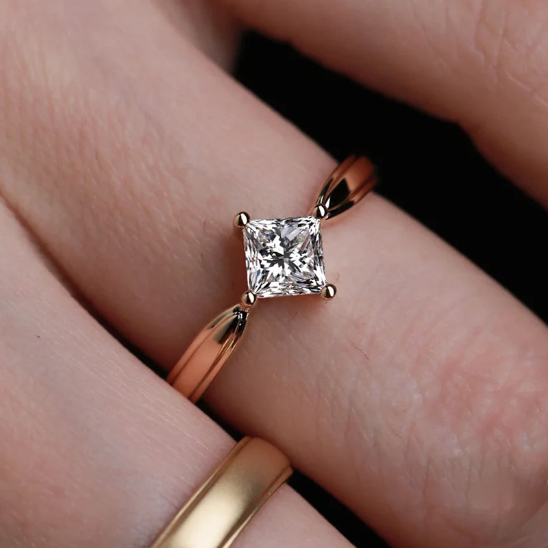 Brilliant Princess Cut Vertical Setting Diamond Ring With Polished Flat Shank with Side Frames wear effect